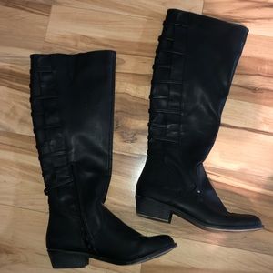 Black tall boot